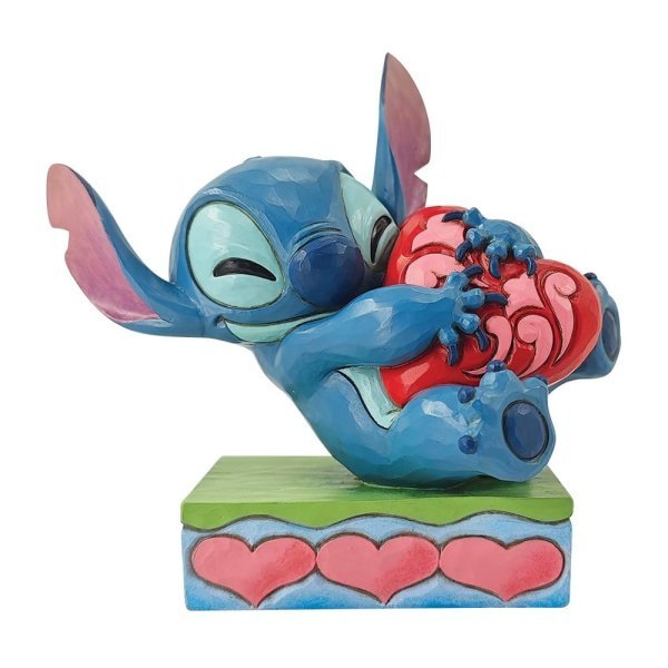 Heart Struck (Stitch Hugging Heart) - Disney Traditions from thetraditionalgiftshop.com