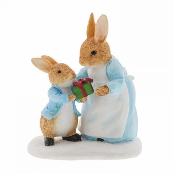 Mrs. Rabbit Passing Peter Rabbit a Present Mini Figure - Beatrix Potter from thetraditionalgiftshop.com